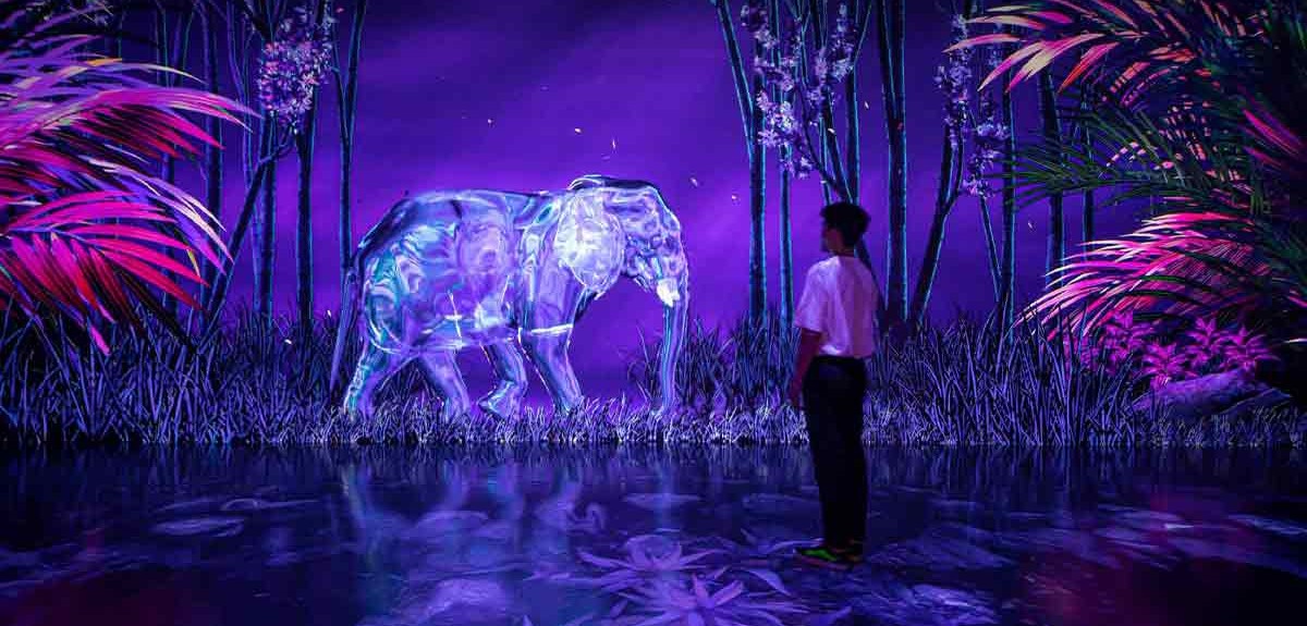 A person stands in a neon-lit world facing a glowing, transparent elephant amidst surreal purple and pink foliage.